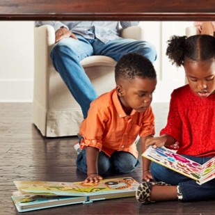 Kids with book | Montgomery's CarpetsPlus COLORTILE